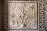 Beautiful plant motifs carved into marble inside Taj Mahal