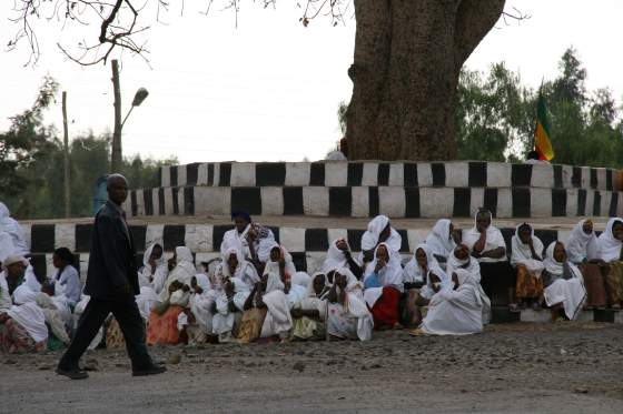 Women crying at the funeral procession