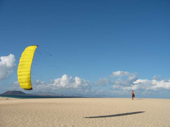 Kite jumping on the beach