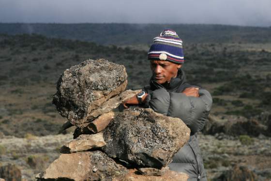 Day 2  ... Shanny contemplates why people put rocks in piles