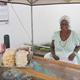 Baiana lady serving Acarajé