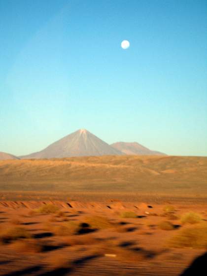 Volcano with full moon