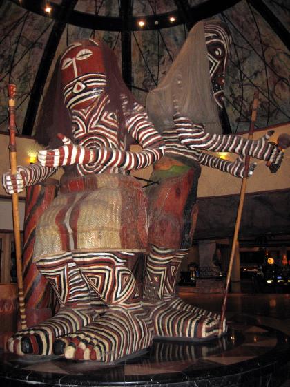 Large scary statues at the entrance to The Kingdom Casino