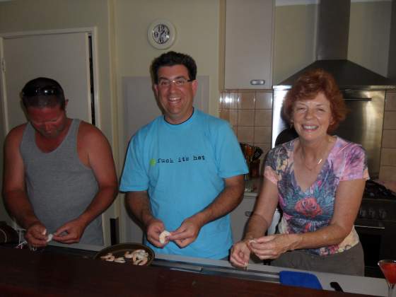 Clint, Tony and Genie shelling prawns