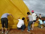 Team effort to deflate the balloon